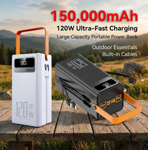 Portable power bank with 150,000mAh capacity on a wooden surface with a scenic background.