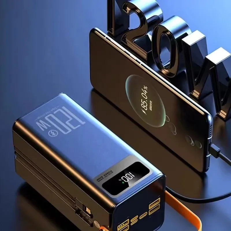 Power bank and smartphone with charging cable on a reflective surface, featuring '120W' branding.