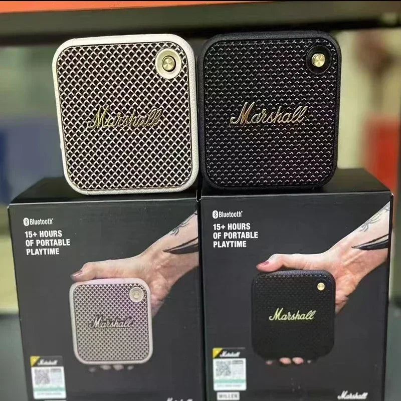 Marshall portable speaker with packaging displaying product and brand details.