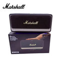 Marshall portable speaker with its packaging on a white background