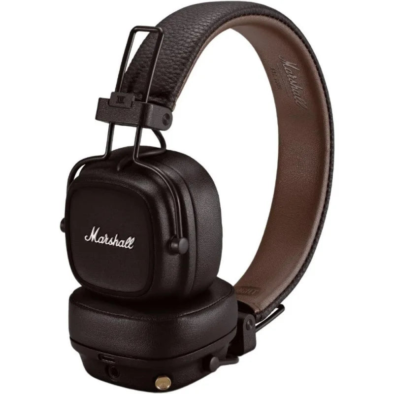 Marshall headphones with brown leather headband on a white background