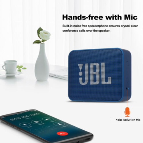 Blue JBL speaker with smartphone on a white surface, featuring text about hands-free calling with mic.