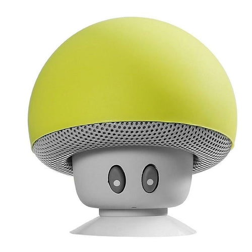Mushroom-shaped speaker with a green top and gray base on a white background